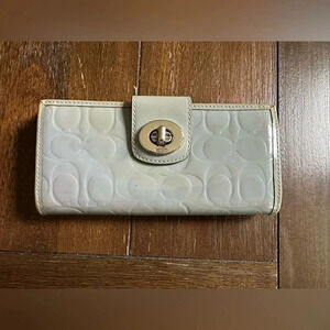 Coach turn lock wallet